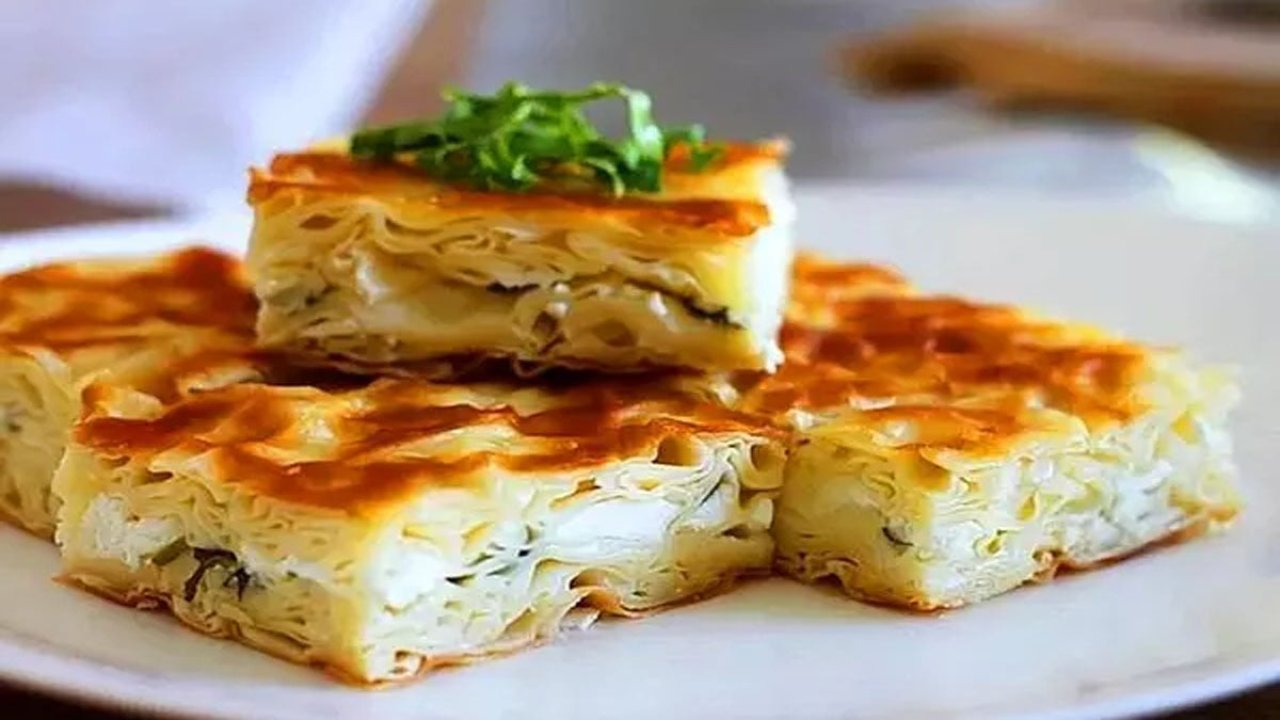 Hamur yoğurup açmanıza gerek olmayan pratik su böreği tarifi! 4 501438